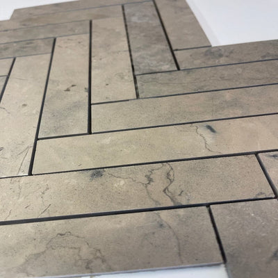 Nova Gray honed 1x6 Herringbone Limestone Mosaic Tile.